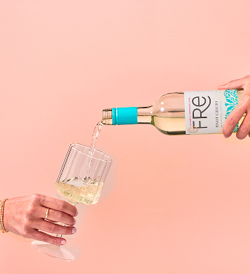 Bottle of Fre Alcohol-Removed wines pinot grigio being poured into a wine glass